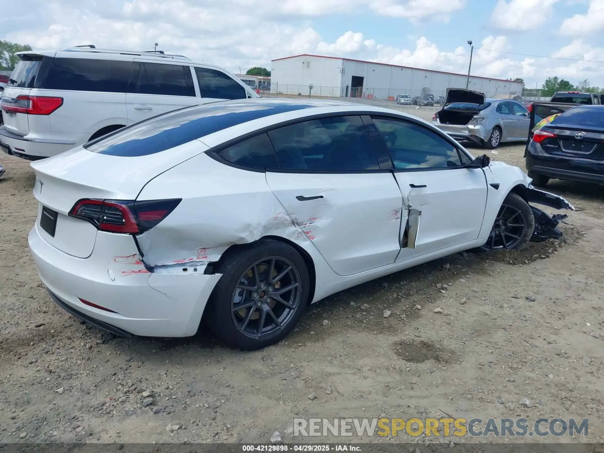 4 Photograph of a damaged car 5YJ3E1EA8PF690033 TESLA MODEL 3 2023