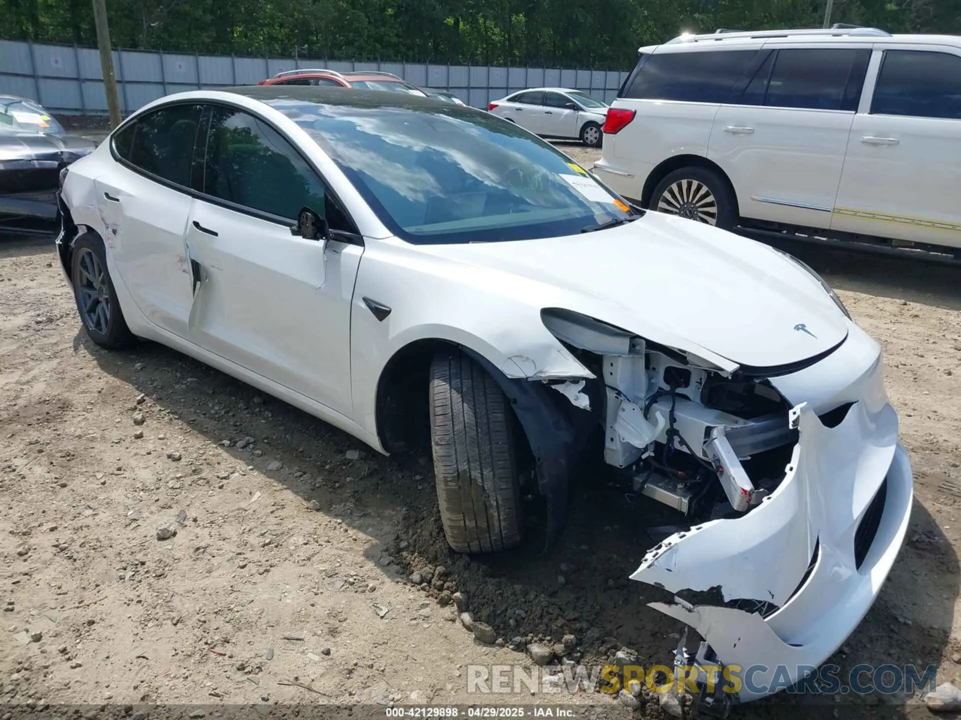 6 Photograph of a damaged car 5YJ3E1EA8PF690033 TESLA MODEL 3 2023