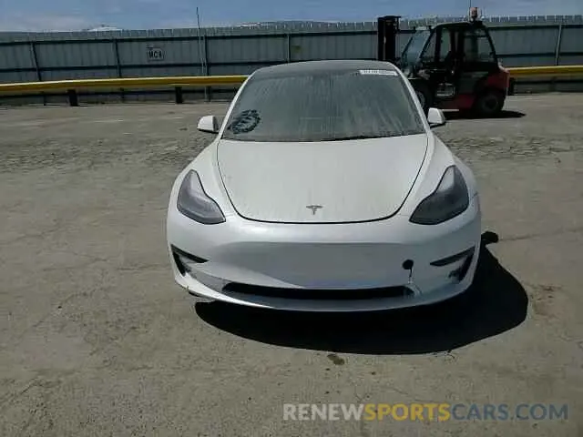 11 Photograph of a damaged car 5YJ3E1EA8PF715450 TESLA MODEL 3 2023