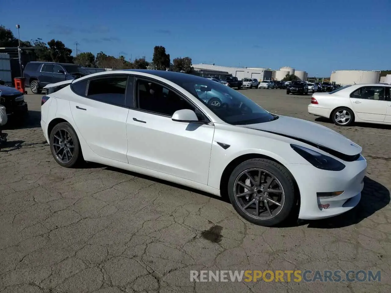 4 Photograph of a damaged car 5YJ3E1EA8PF715450 TESLA MODEL 3 2023