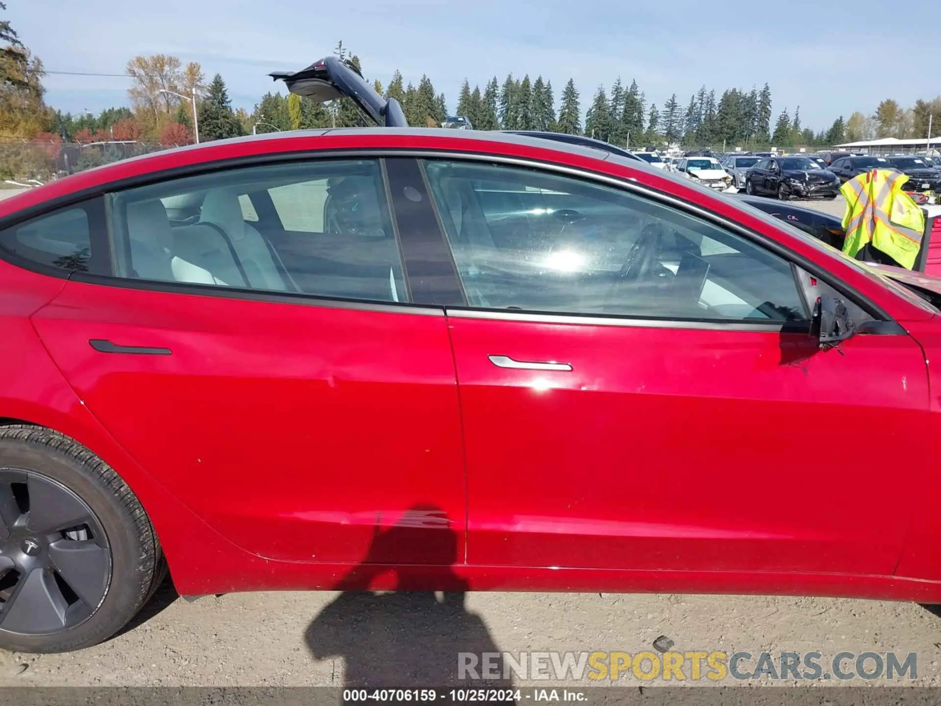 13 Photograph of a damaged car 5YJ3E1EA9PF382563 TESLA MODEL 3 2023