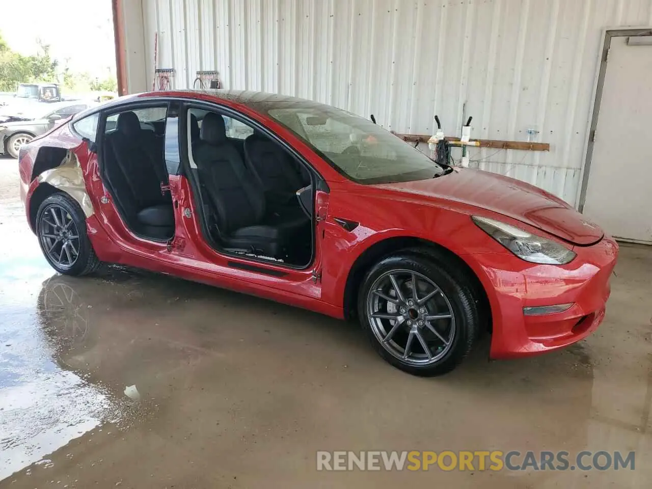 4 Photograph of a damaged car 5YJ3E1EA9PF403671 TESLA MODEL 3 2023