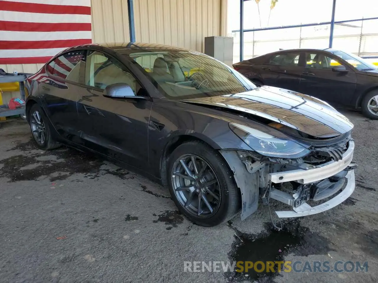 4 Photograph of a damaged car 5YJ3E1EA9PF451039 TESLA MODEL 3 2023