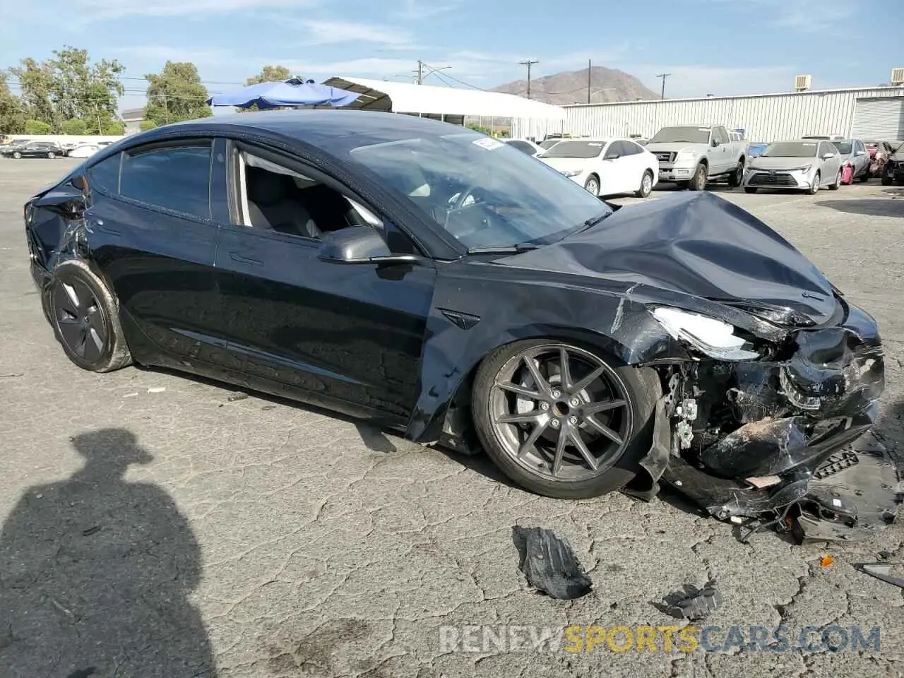 4 Photograph of a damaged car 5YJ3E1EA9PF457164 TESLA MODEL 3 2023