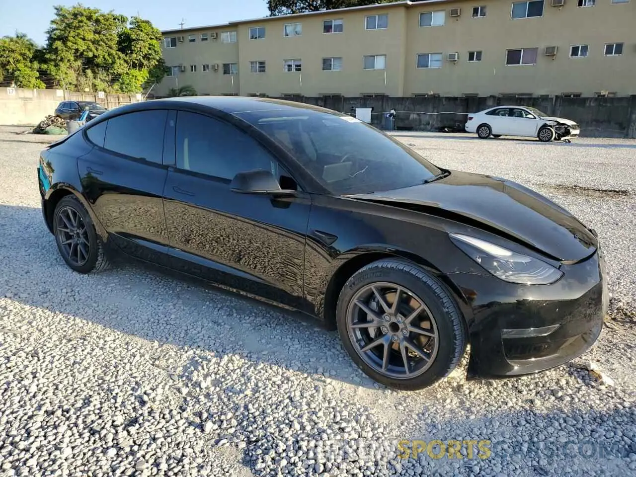 4 Photograph of a damaged car 5YJ3E1EA9PF488060 TESLA MODEL 3 2023
