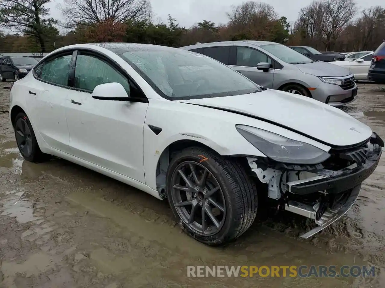 4 Photograph of a damaged car 5YJ3E1EA9PF497583 TESLA MODEL 3 2023