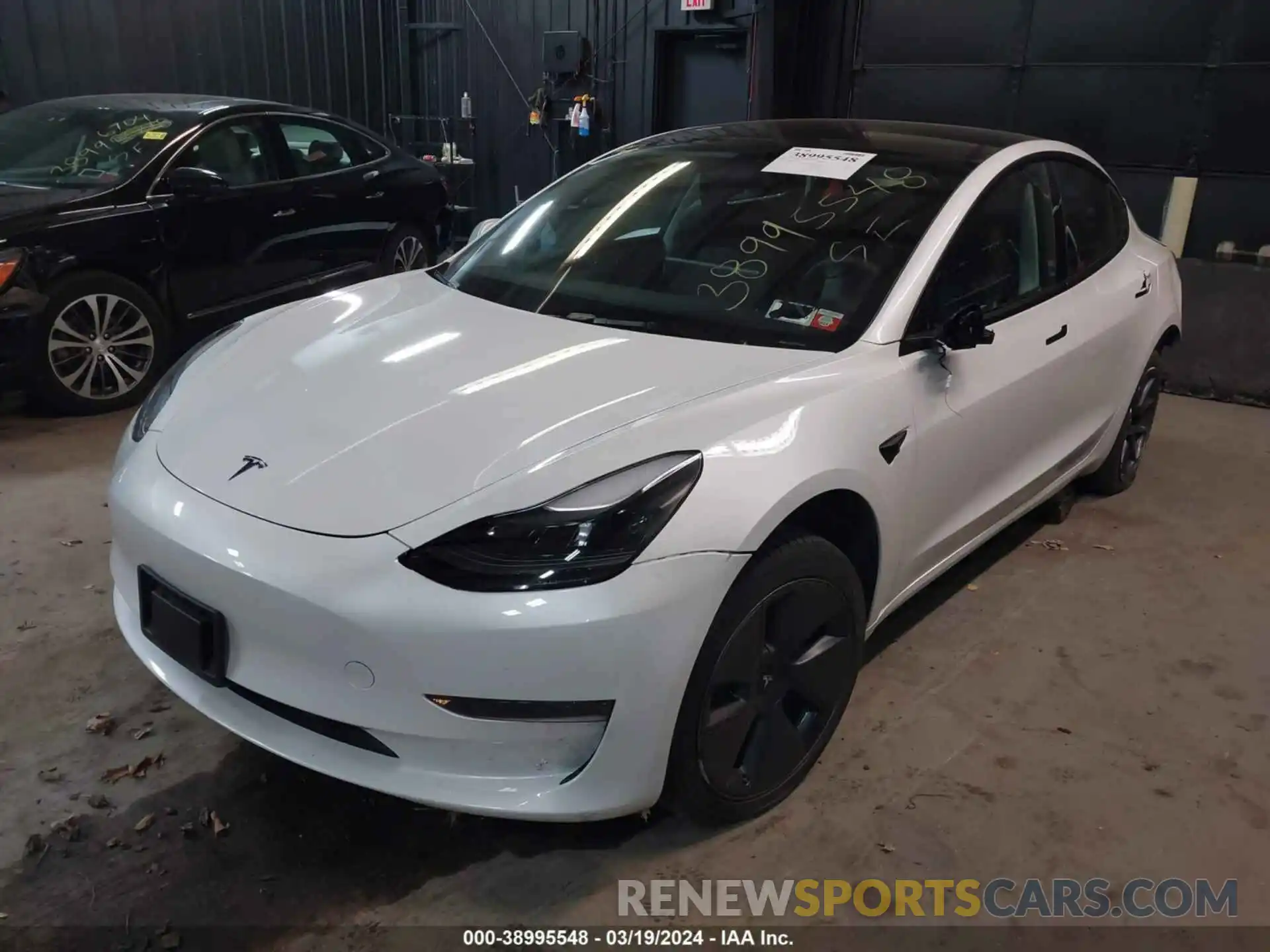 2 Photograph of a damaged car 5YJ3E1EA9PF554607 TESLA MODEL 3 2023