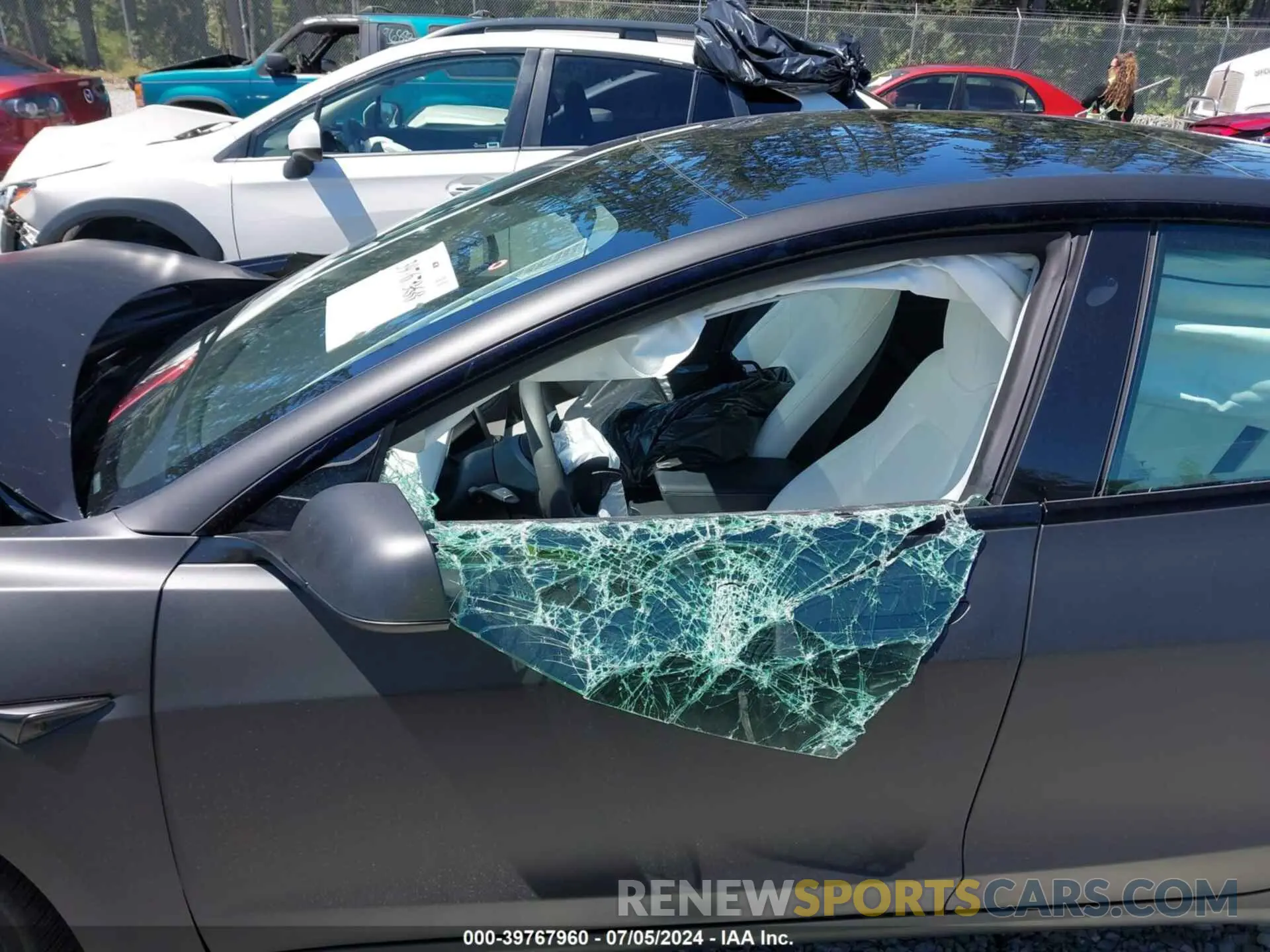 18 Photograph of a damaged car 5YJ3E1EA9PF564327 TESLA MODEL 3 2023