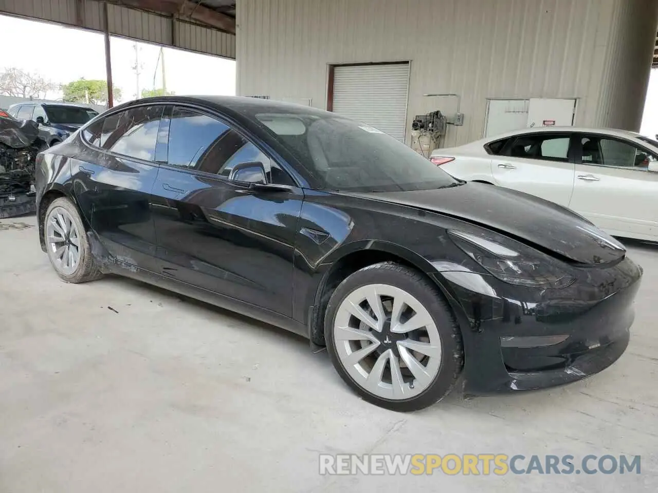4 Photograph of a damaged car 5YJ3E1EA9PF565266 TESLA MODEL 3 2023