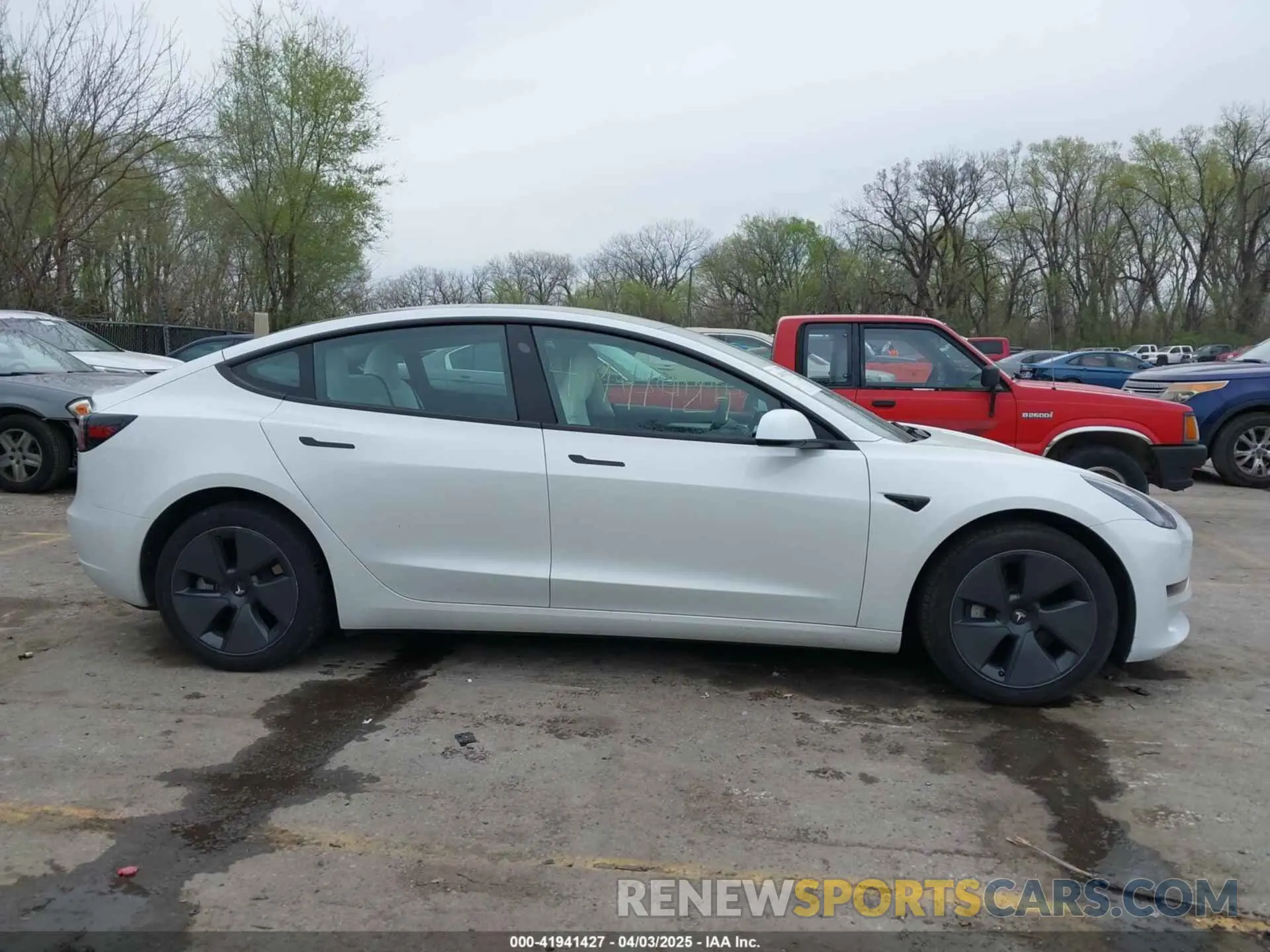 13 Photograph of a damaged car 5YJ3E1EA9PF569415 TESLA MODEL 3 2023