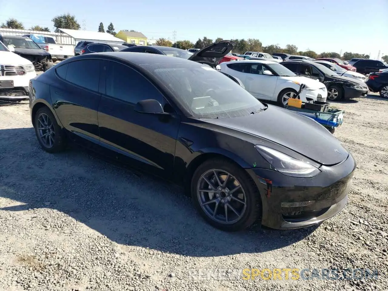 4 Photograph of a damaged car 5YJ3E1EA9PF609797 TESLA MODEL 3 2023