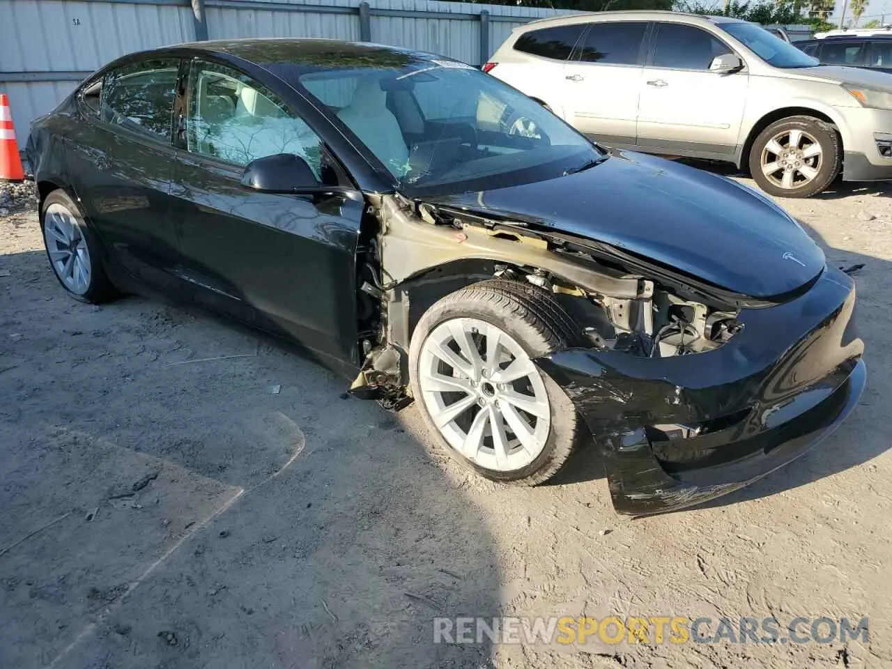 4 Photograph of a damaged car 5YJ3E1EA9PF615017 TESLA MODEL 3 2023