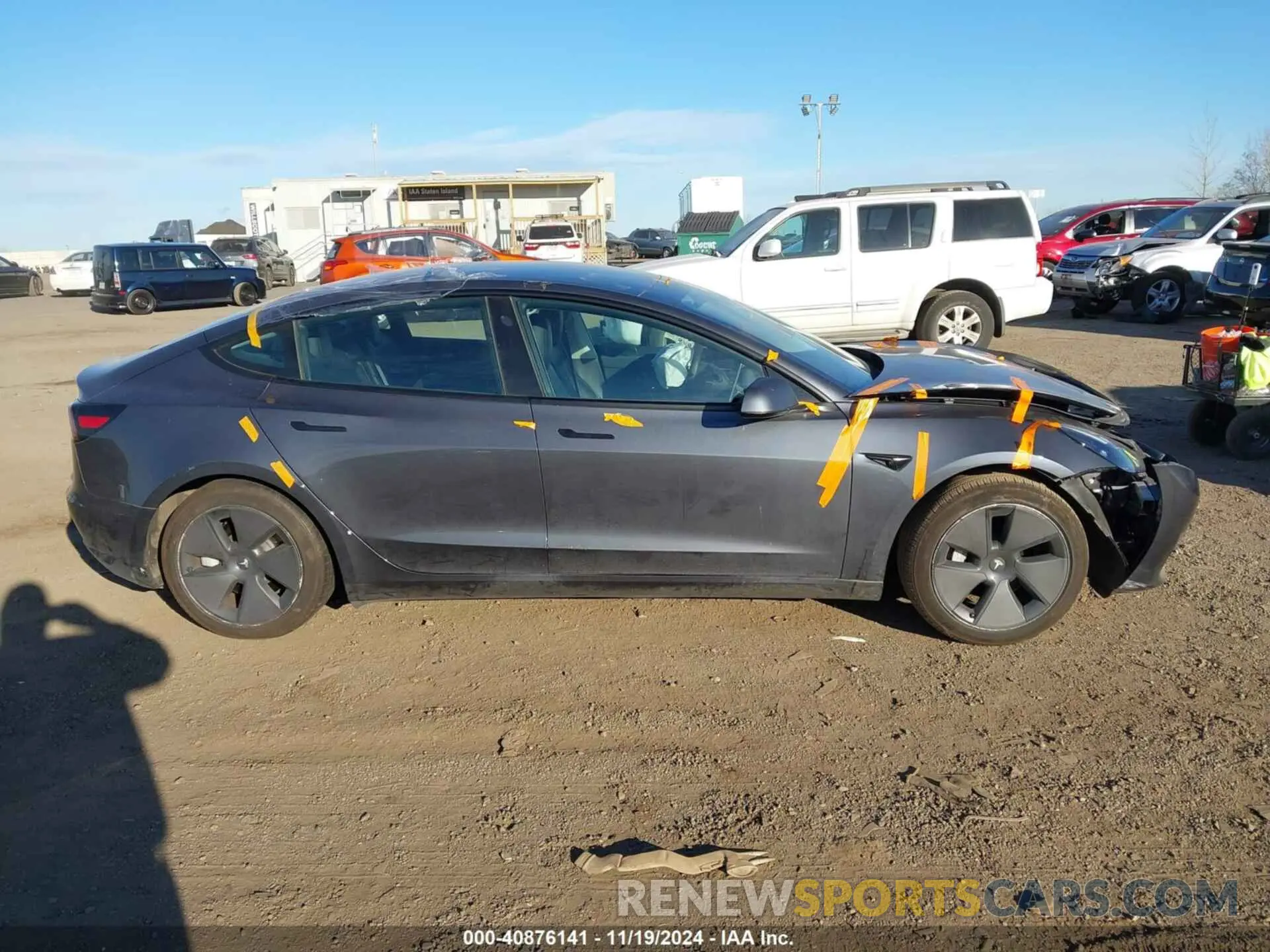 12 Photograph of a damaged car 5YJ3E1EA9PF652262 TESLA MODEL 3 2023