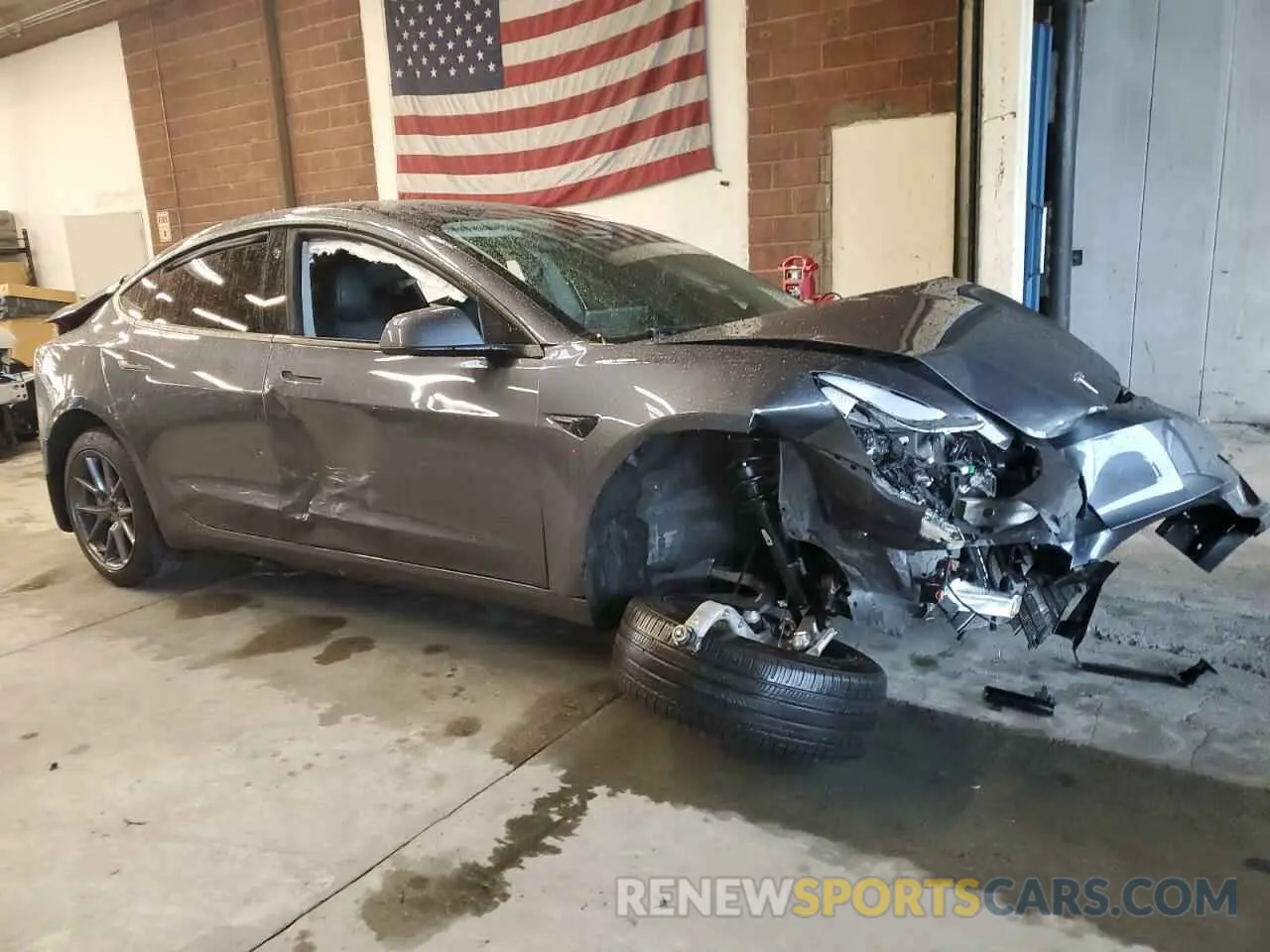 4 Photograph of a damaged car 5YJ3E1EA9PF657431 TESLA MODEL 3 2023