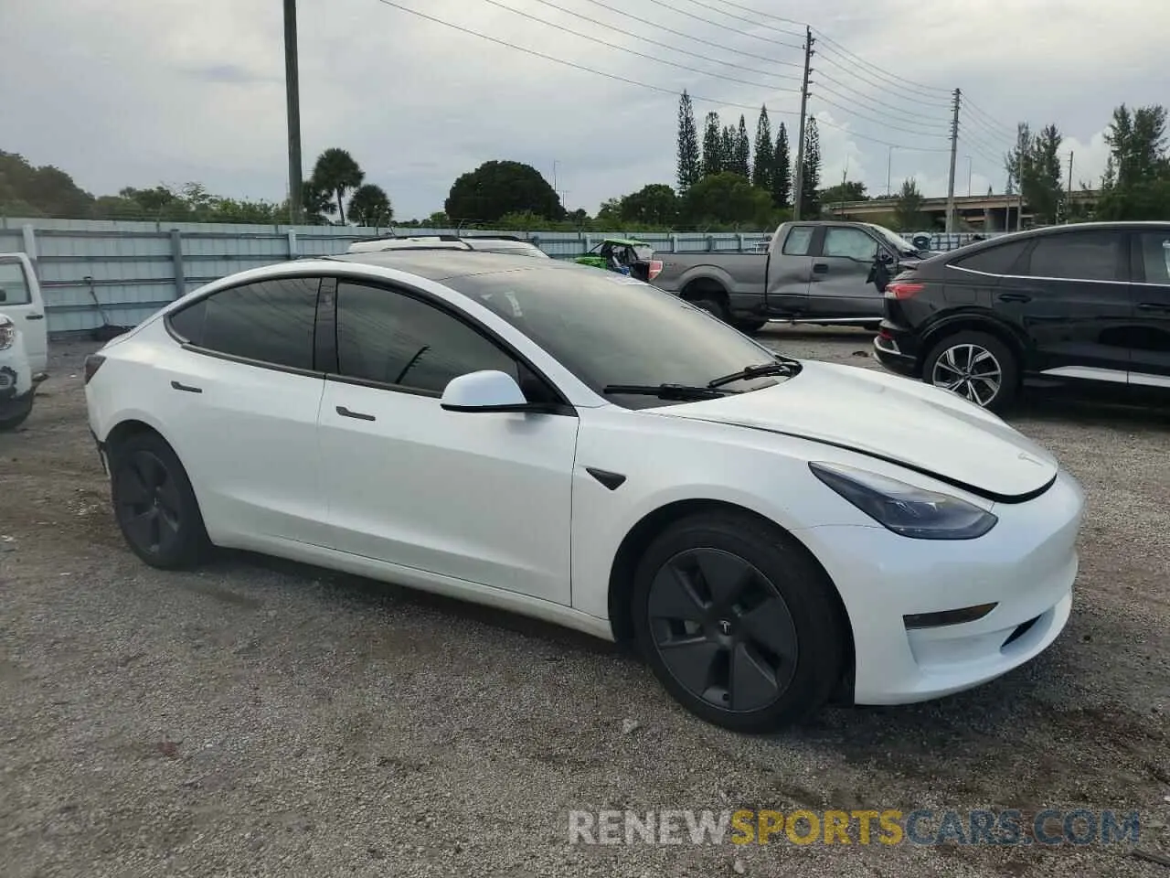 4 Photograph of a damaged car 5YJ3E1EA9PF671040 TESLA MODEL 3 2023