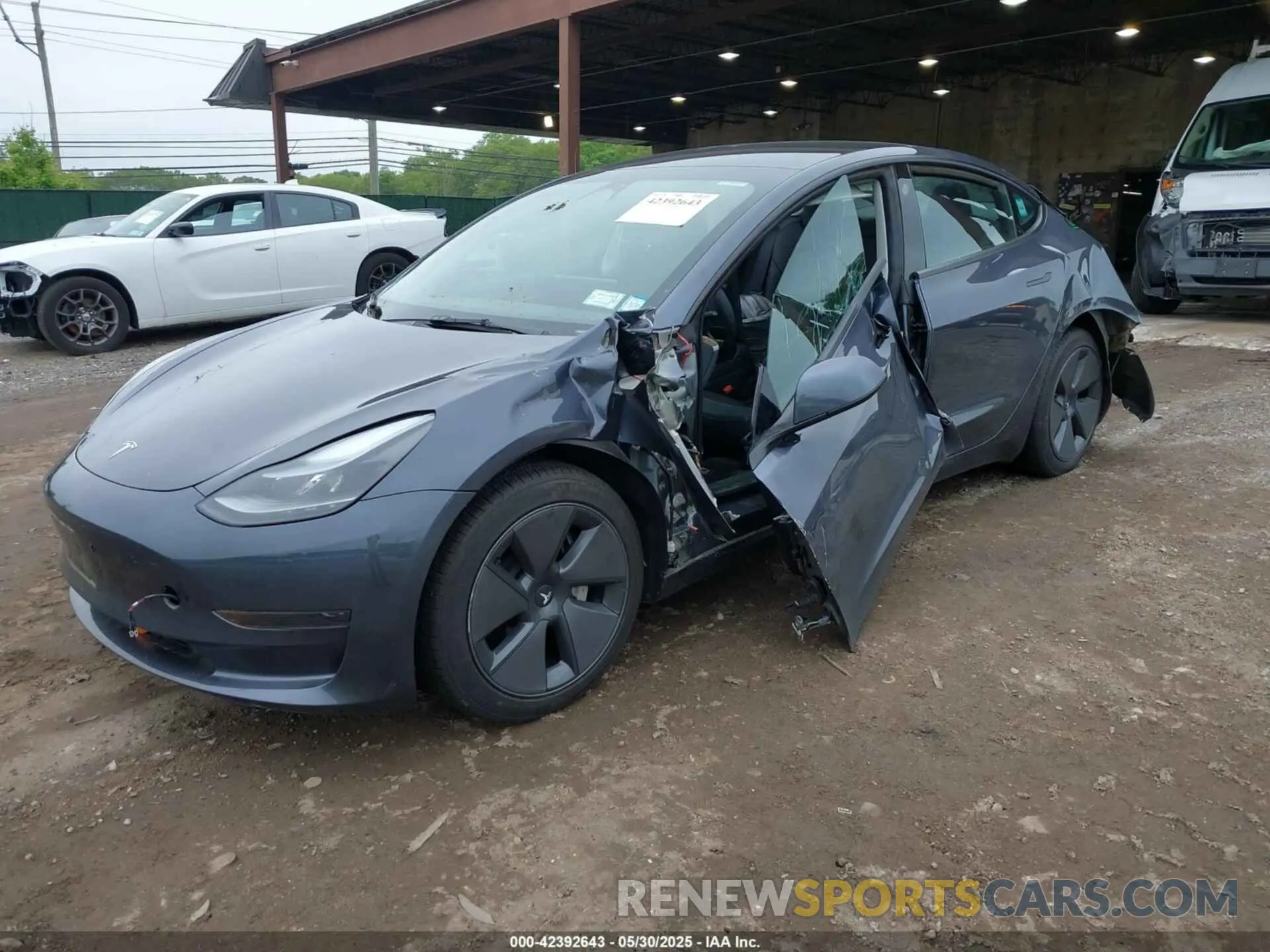 6 Photograph of a damaged car 5YJ3E1EA9PF673399 TESLA MODEL 3 2023