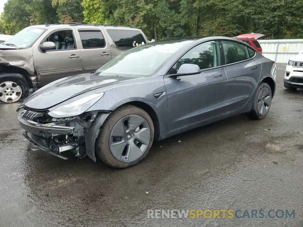 1 Photograph of a damaged car 5YJ3E1EA9PF699016 TESLA MODEL 3 2023