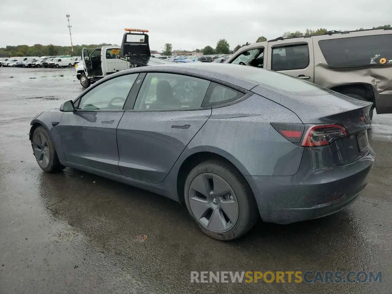 2 Photograph of a damaged car 5YJ3E1EA9PF699016 TESLA MODEL 3 2023
