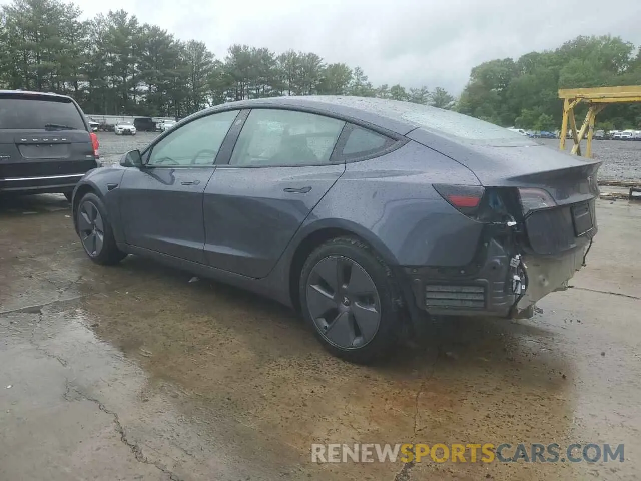 2 Photograph of a damaged car 5YJ3E1EA9PF699744 TESLA MODEL 3 2023