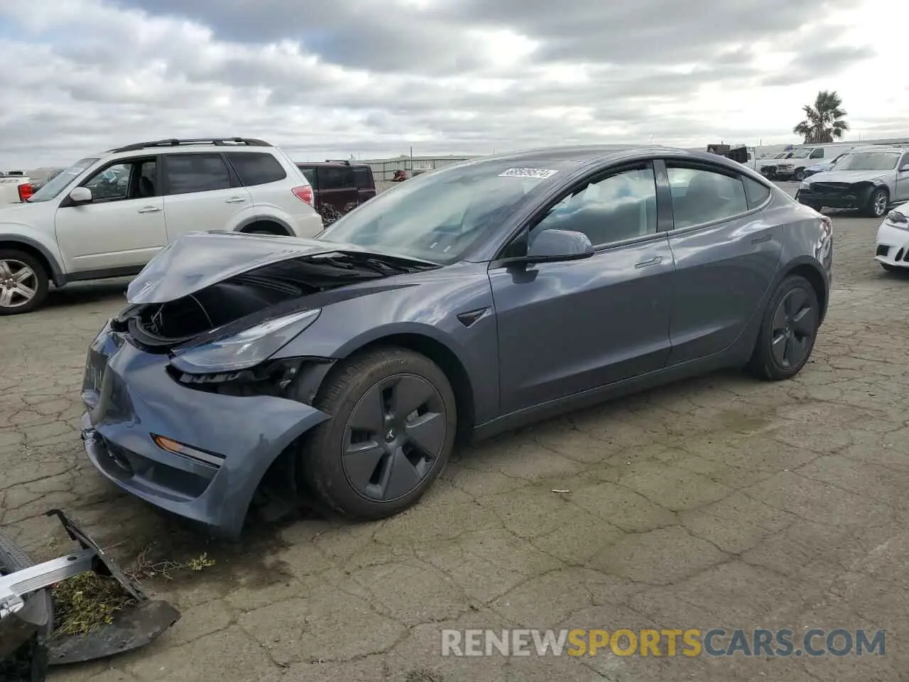 1 Photograph of a damaged car 5YJ3E1EA9PF704747 TESLA MODEL 3 2023