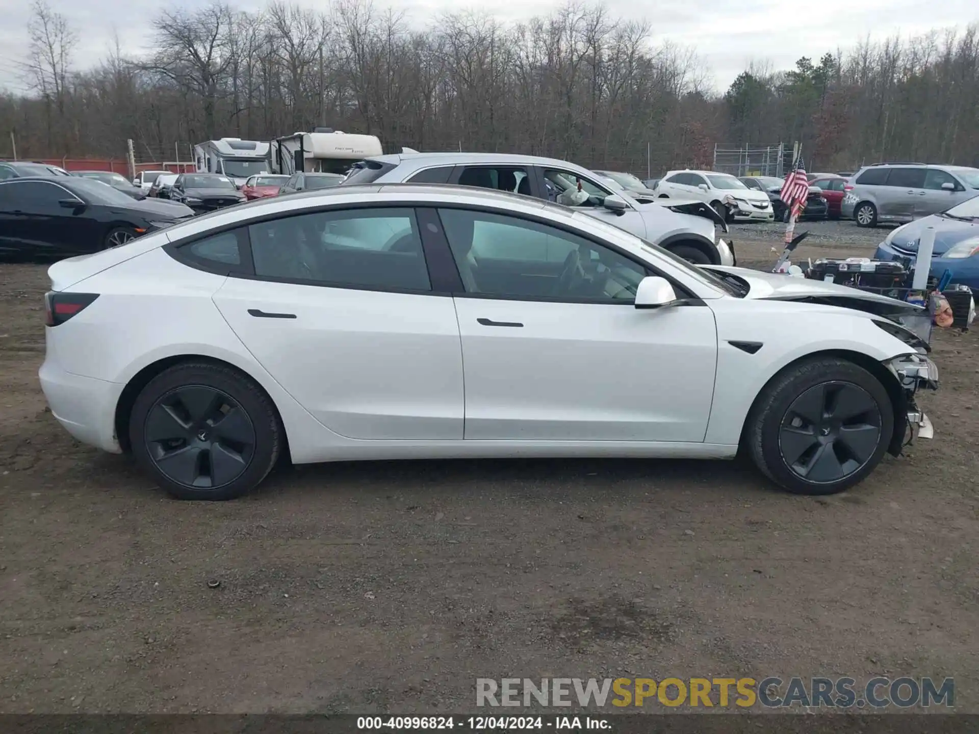 13 Photograph of a damaged car 5YJ3E1EAXPF395693 TESLA MODEL 3 2023