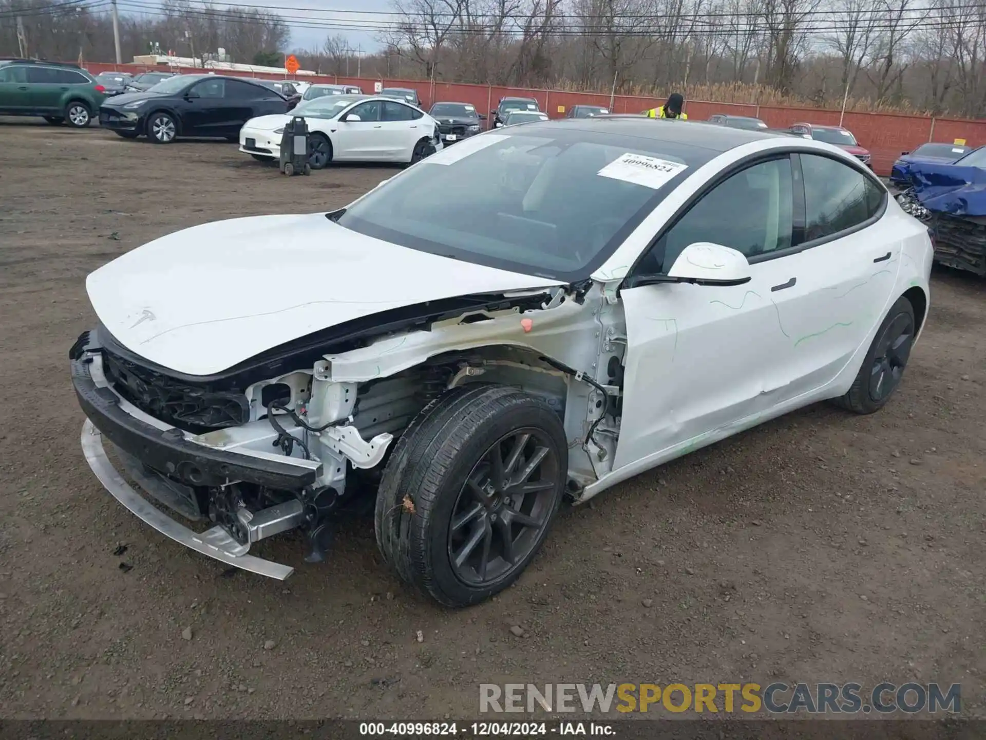 2 Photograph of a damaged car 5YJ3E1EAXPF395693 TESLA MODEL 3 2023