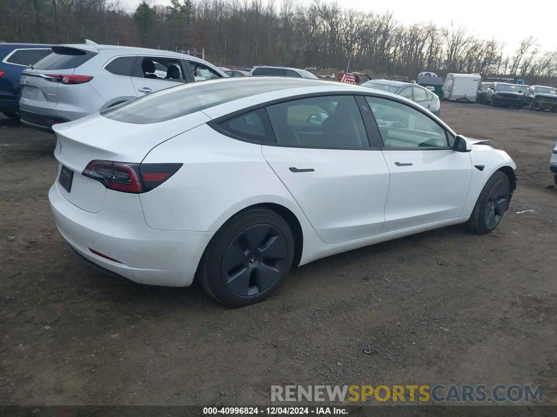 4 Photograph of a damaged car 5YJ3E1EAXPF395693 TESLA MODEL 3 2023