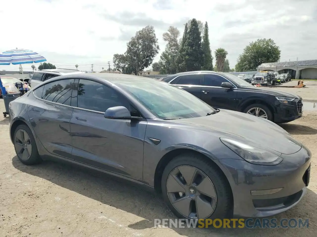 4 Photograph of a damaged car 5YJ3E1EAXPF422407 TESLA MODEL 3 2023