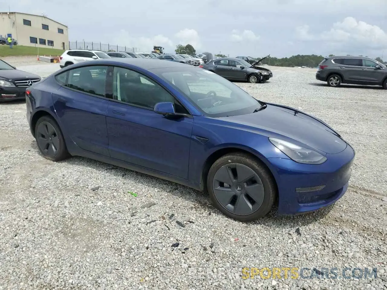 4 Photograph of a damaged car 5YJ3E1EAXPF430023 TESLA MODEL 3 2023