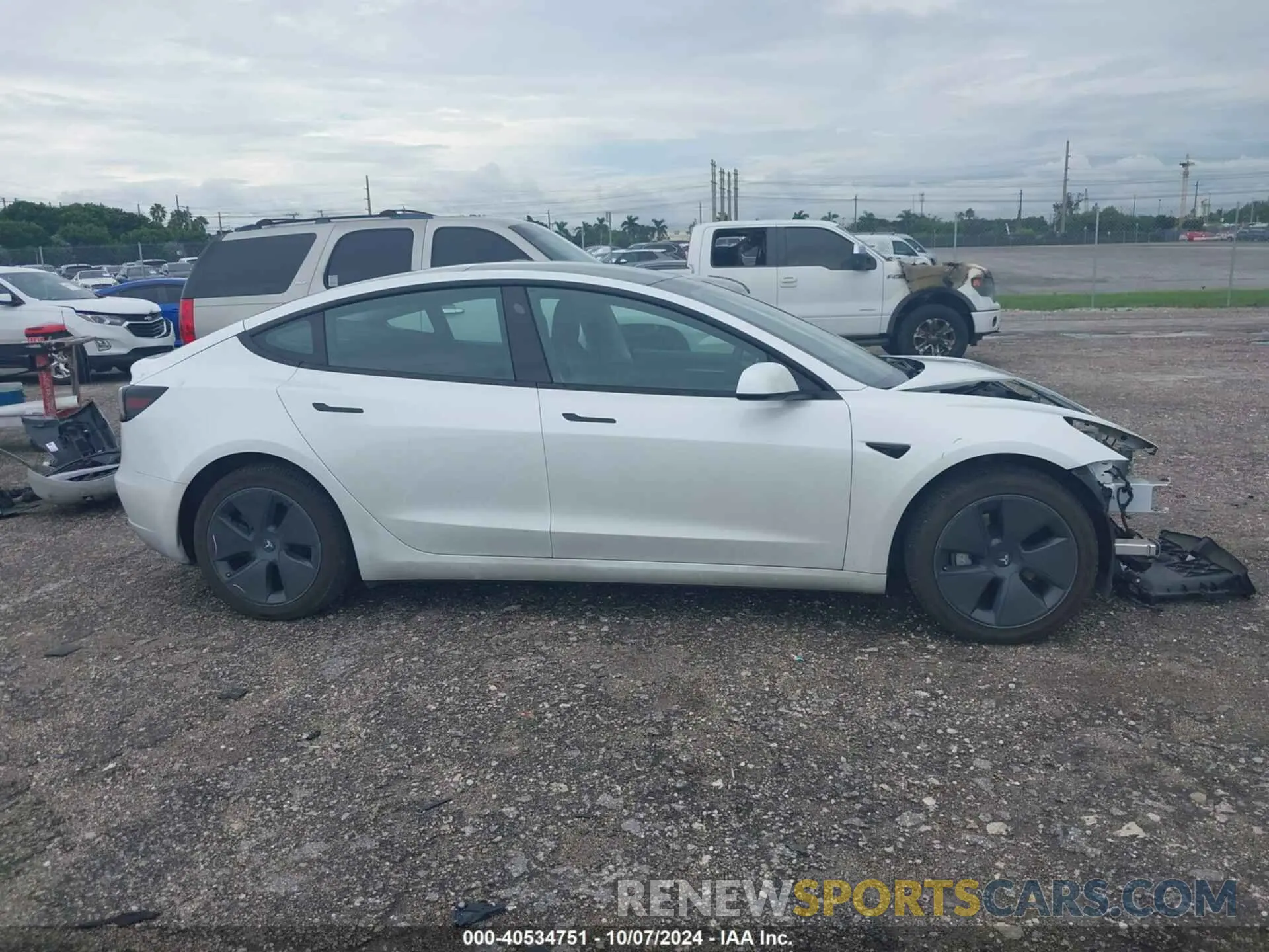 13 Photograph of a damaged car 5YJ3E1EAXPF456282 TESLA MODEL 3 2023