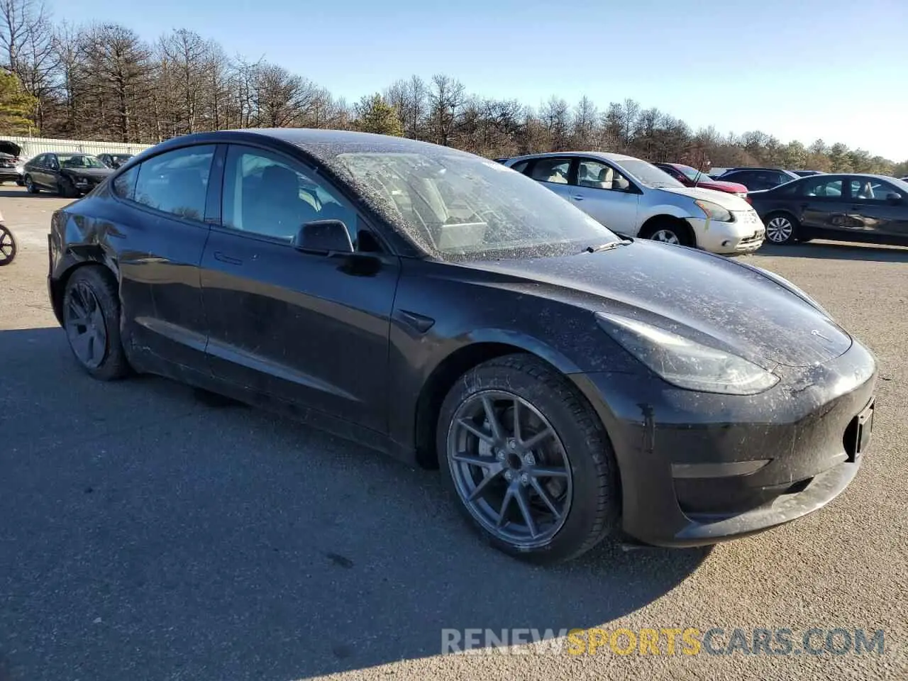 4 Photograph of a damaged car 5YJ3E1EAXPF494403 TESLA MODEL 3 2023
