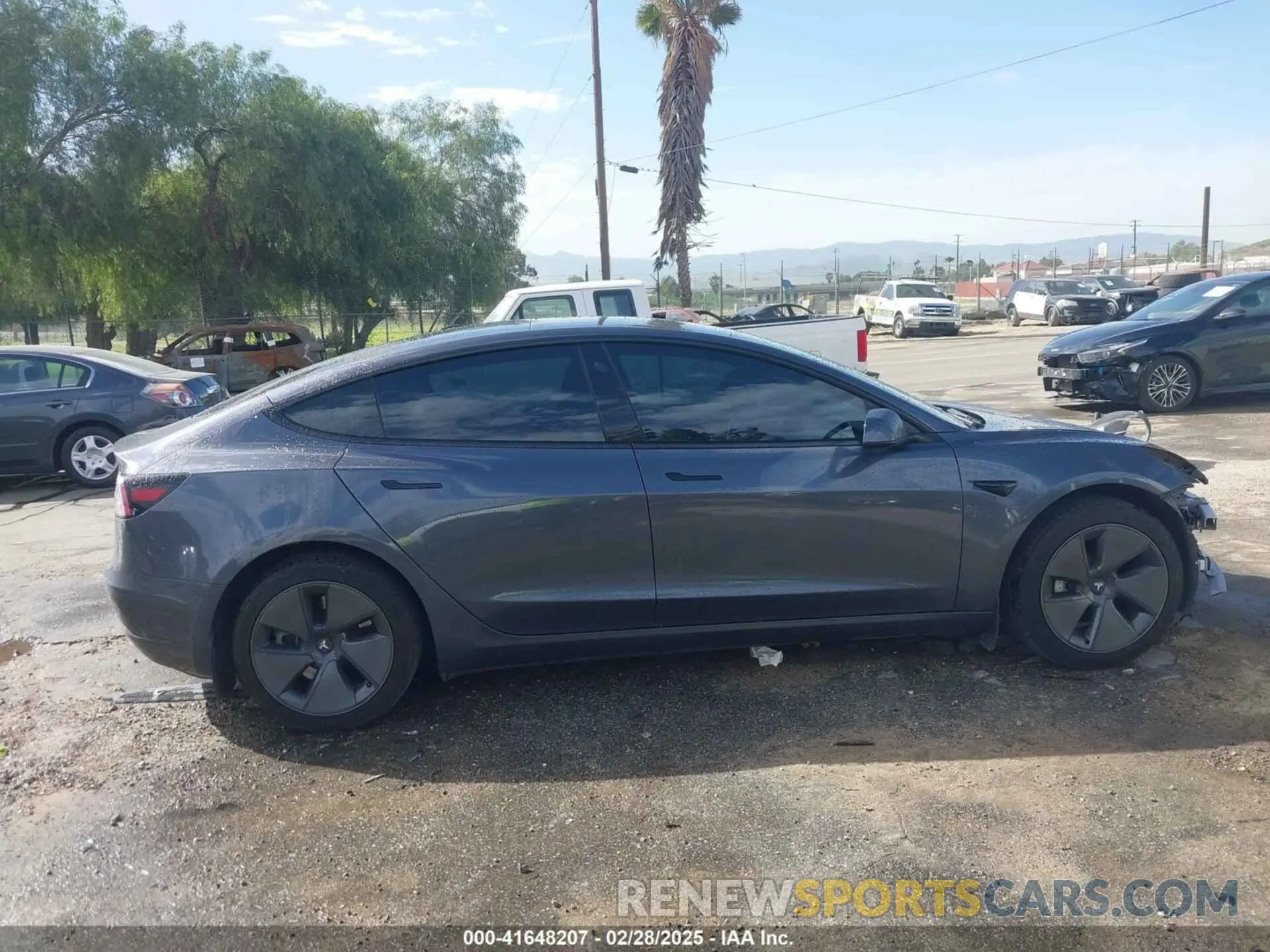 14 Photograph of a damaged car 5YJ3E1EAXPF569360 TESLA MODEL 3 2023