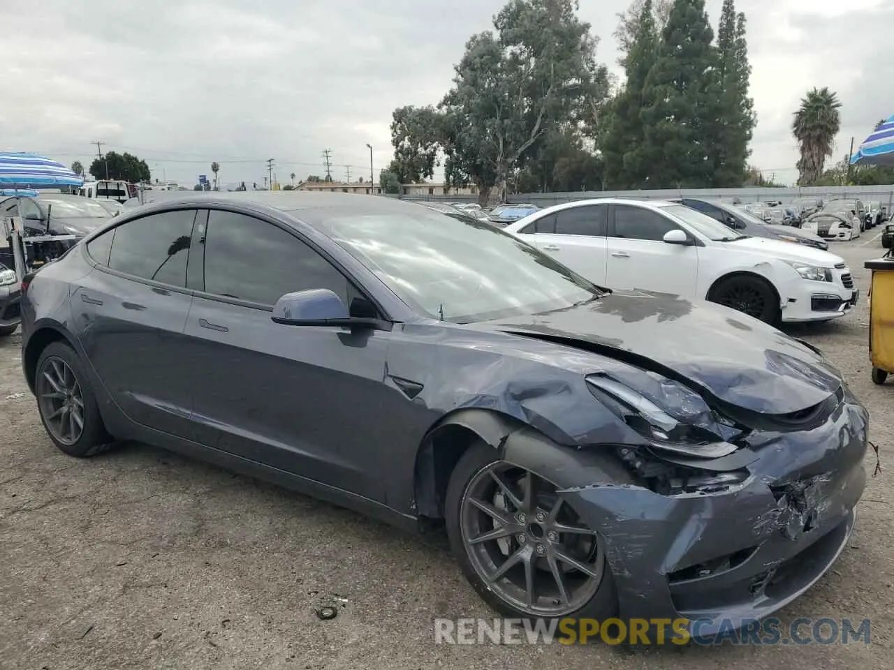 4 Photograph of a damaged car 5YJ3E1EAXPF570668 TESLA MODEL 3 2023