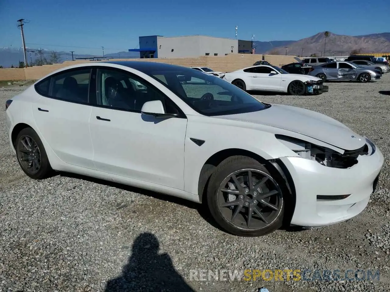 4 Photograph of a damaged car 5YJ3E1EAXPF571822 TESLA MODEL 3 2023