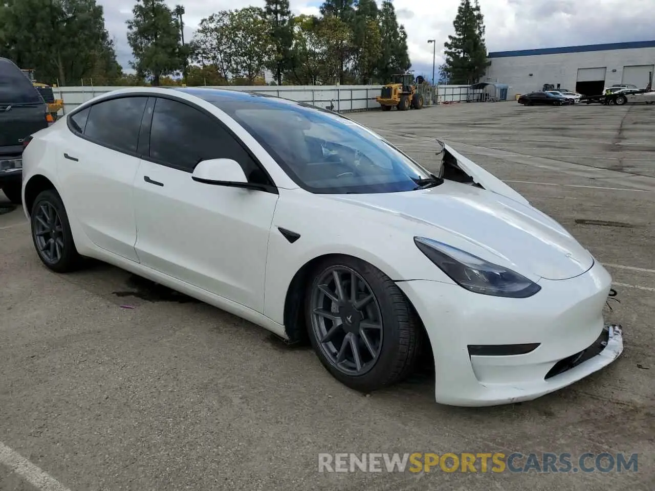 4 Photograph of a damaged car 5YJ3E1EAXPF574333 TESLA MODEL 3 2023