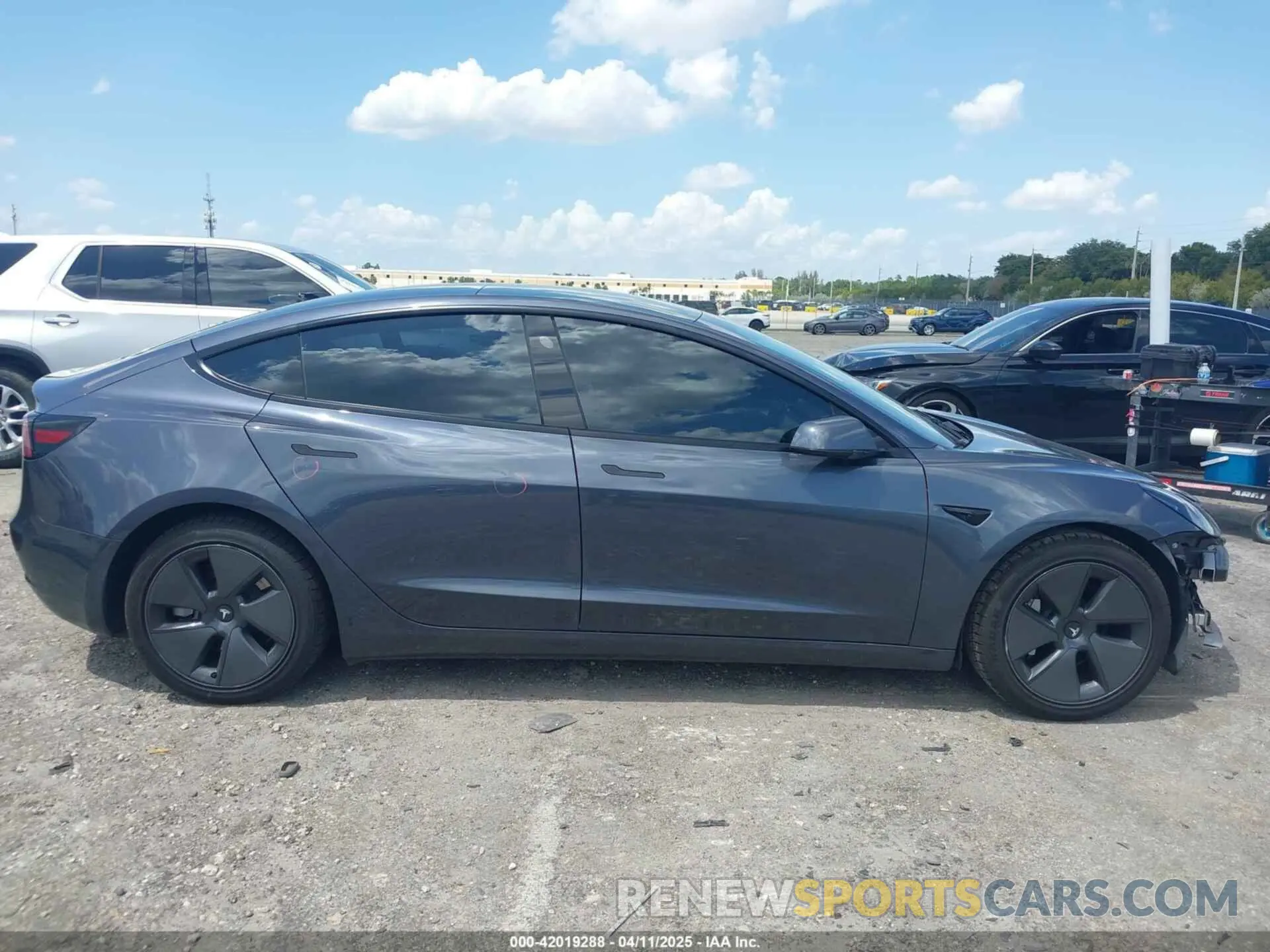 14 Photograph of a damaged car 5YJ3E1EAXPF575448 TESLA MODEL 3 2023