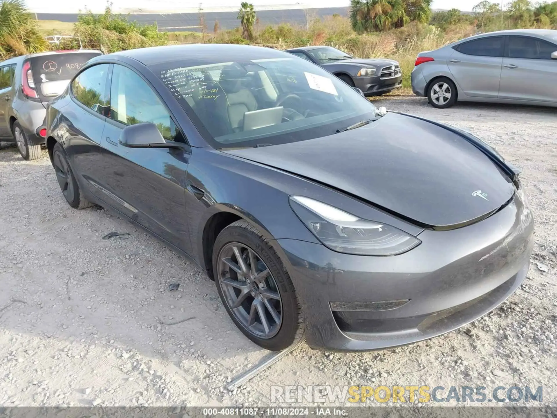 1 Photograph of a damaged car 5YJ3E1EAXPF591777 TESLA MODEL 3 2023