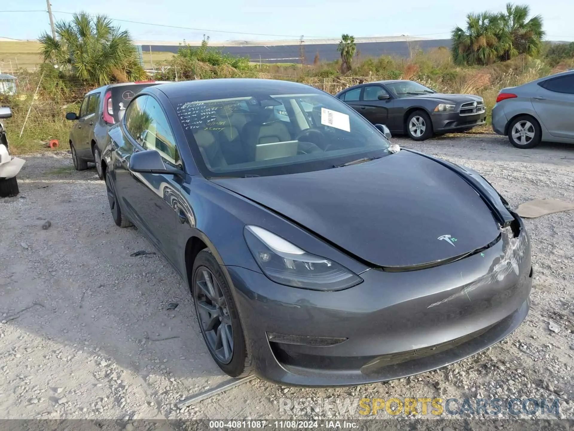 12 Photograph of a damaged car 5YJ3E1EAXPF591777 TESLA MODEL 3 2023