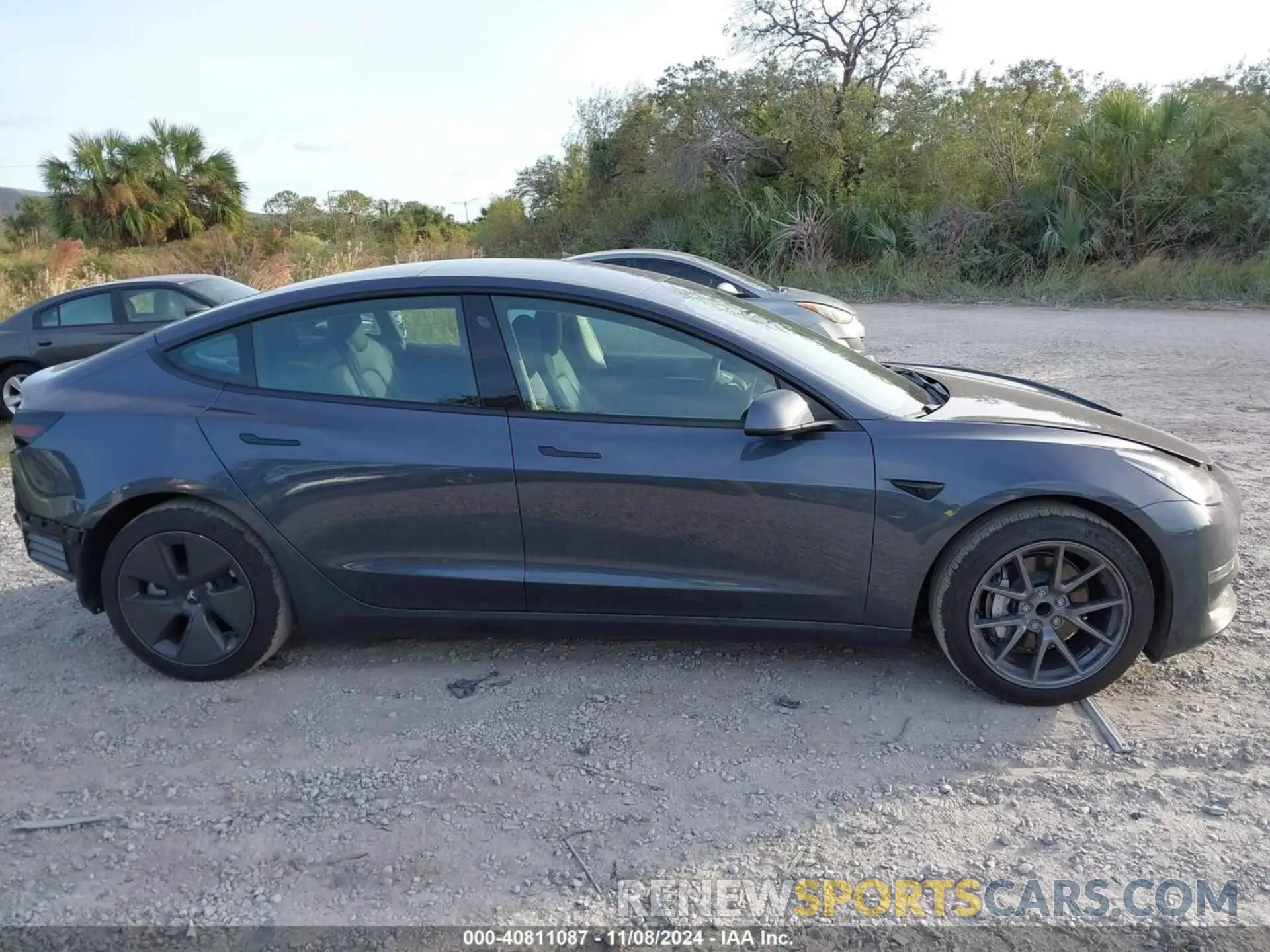 13 Photograph of a damaged car 5YJ3E1EAXPF591777 TESLA MODEL 3 2023