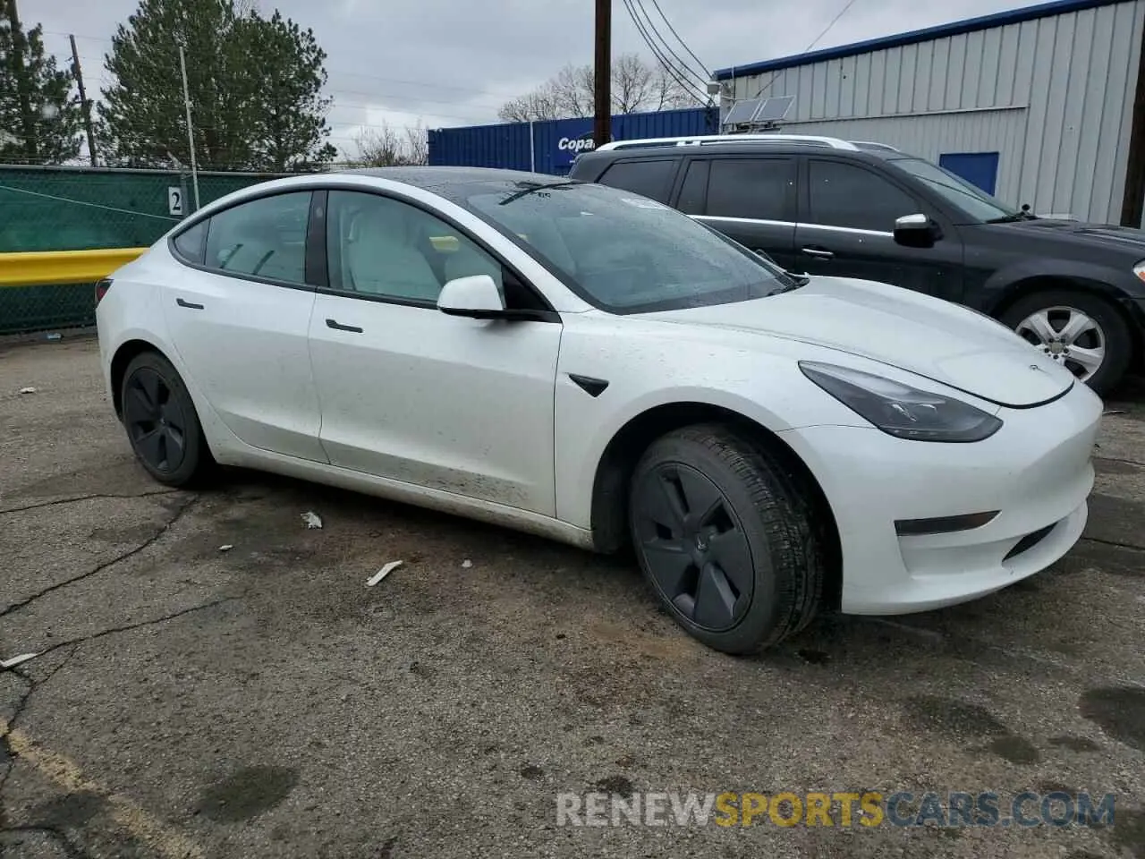4 Photograph of a damaged car 5YJ3E1EAXPF600008 TESLA MODEL 3 2023