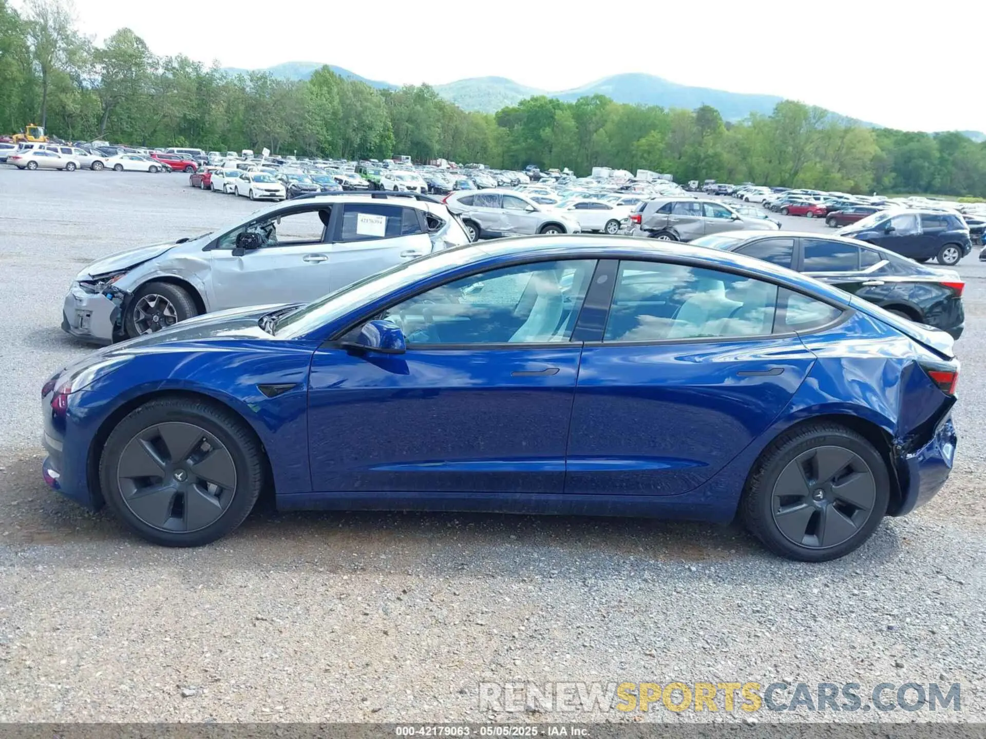 14 Photograph of a damaged car 5YJ3E1EAXPF620484 TESLA MODEL 3 2023
