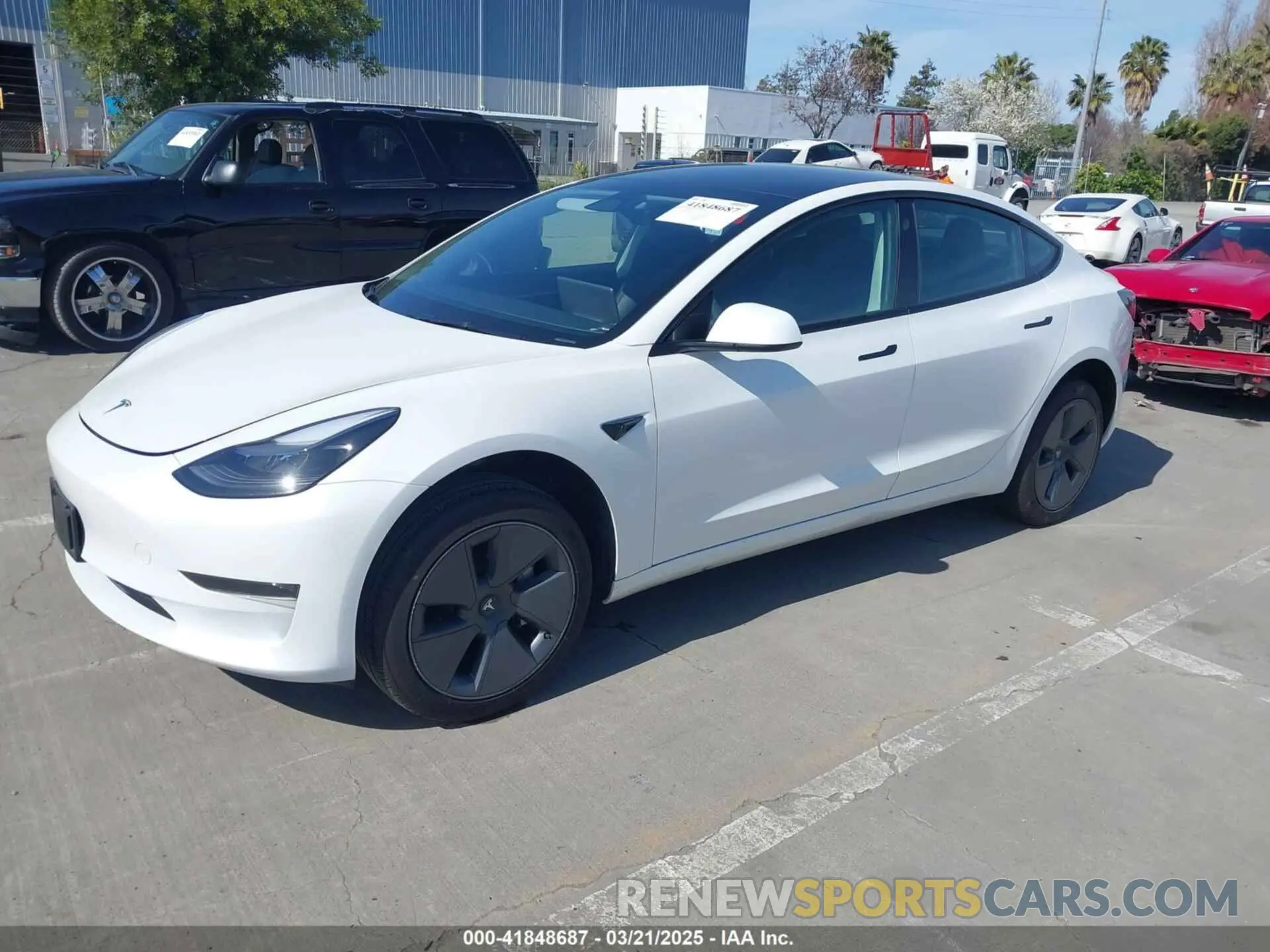 2 Photograph of a damaged car 5YJ3E1EAXPF646809 TESLA MODEL 3 2023