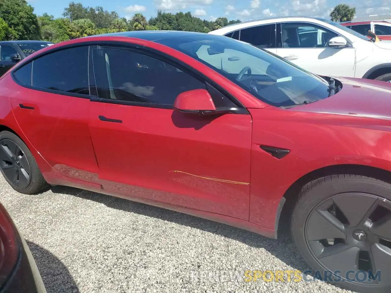 12 Photograph of a damaged car 5YJ3E1EAXPF677929 TESLA MODEL 3 2023