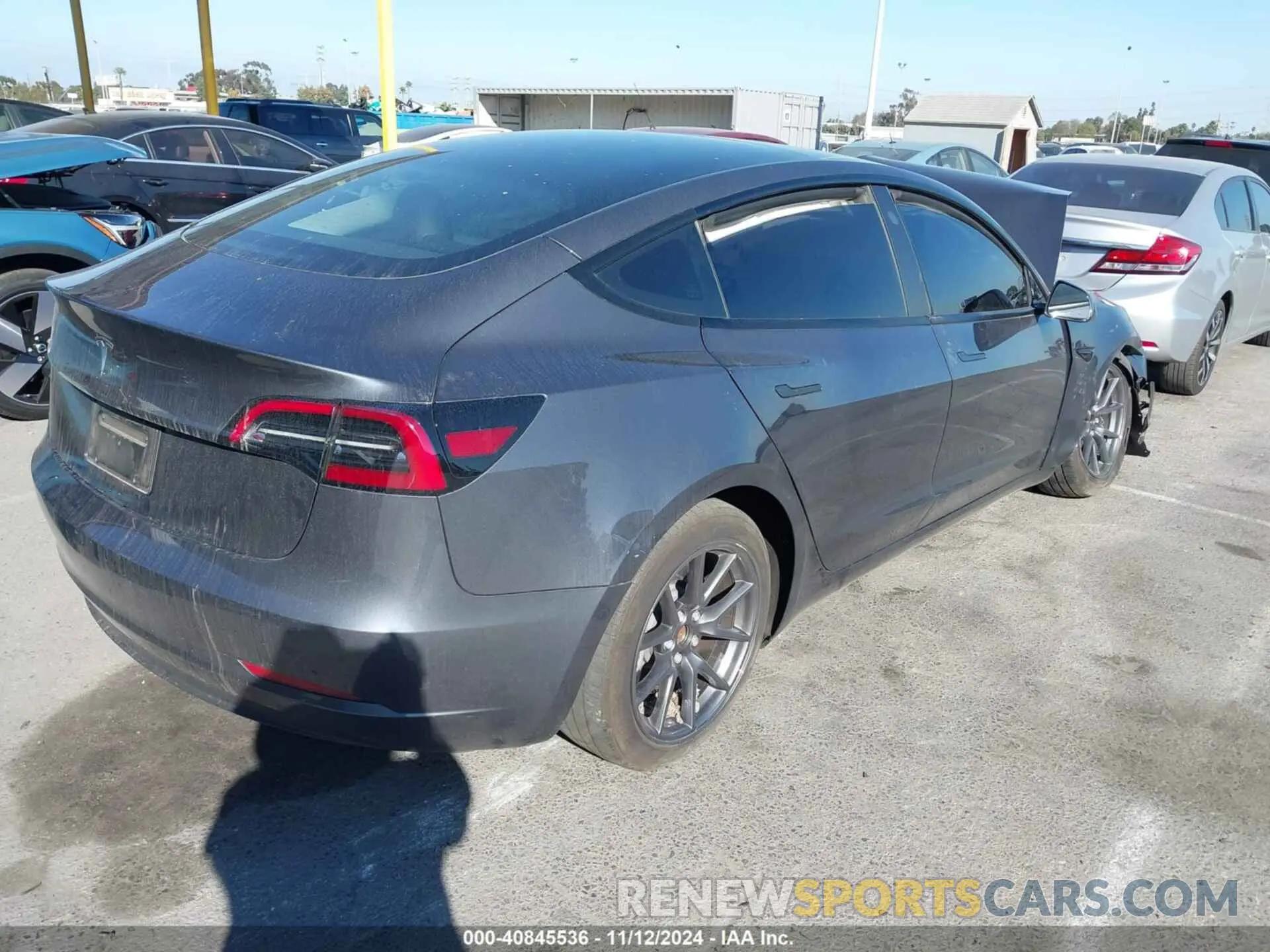 4 Photograph of a damaged car 5YJ3E1EAXPF679258 TESLA MODEL 3 2023