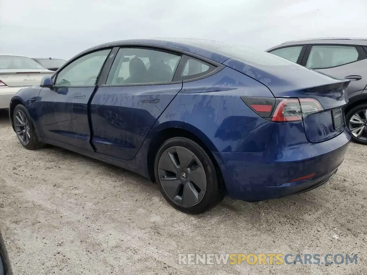 2 Photograph of a damaged car 5YJ3E1EAXPF699459 TESLA MODEL 3 2023