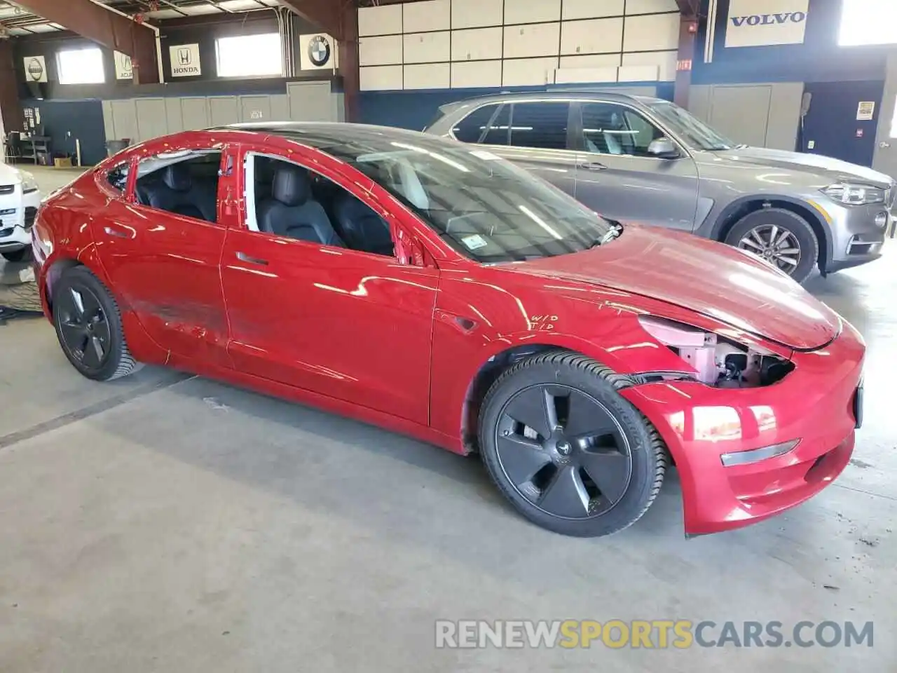 4 Photograph of a damaged car 5YJ3E1EB0PF389247 TESLA MODEL 3 2023