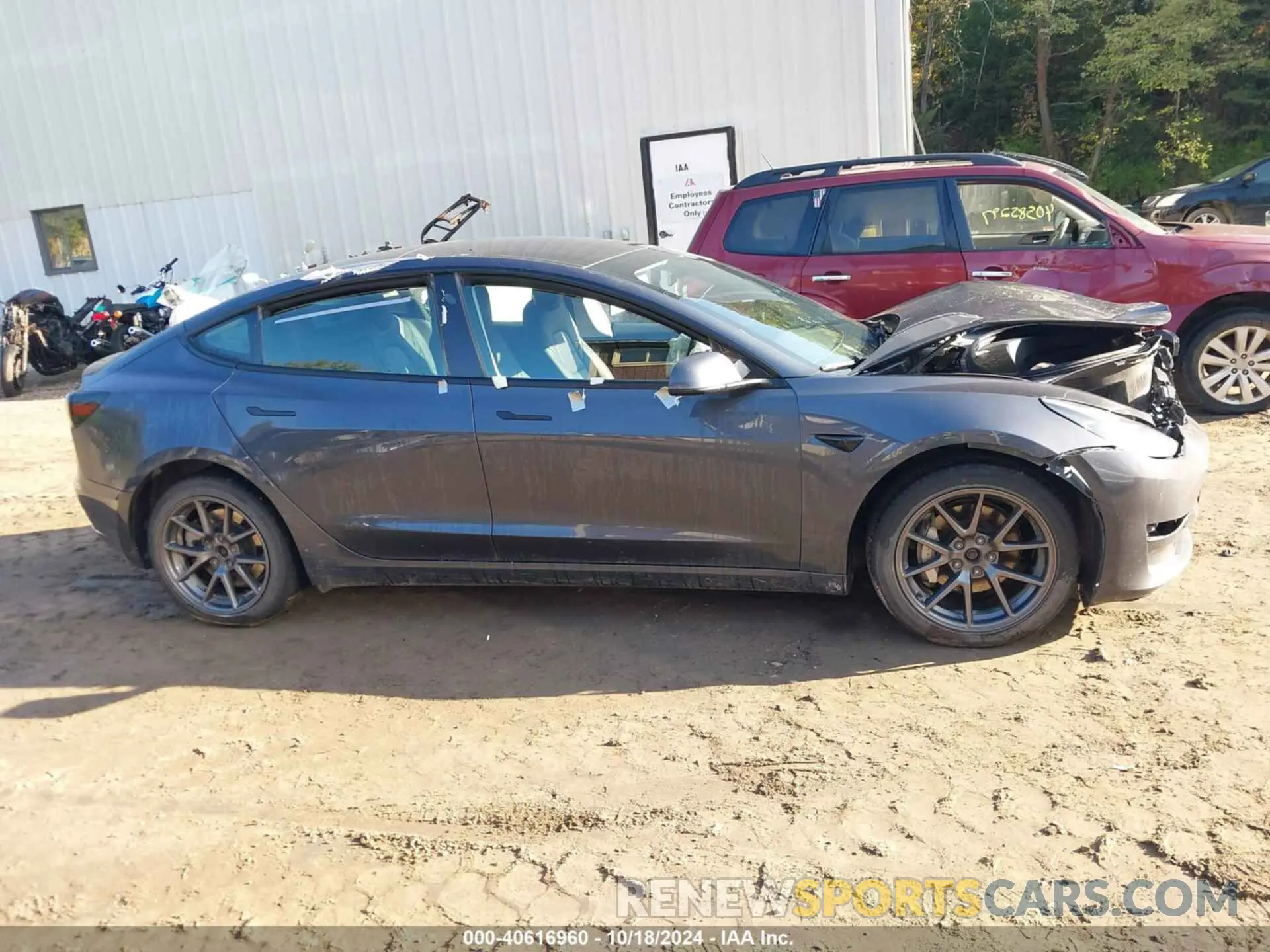 13 Photograph of a damaged car 5YJ3E1EB0PF392794 TESLA MODEL 3 2023
