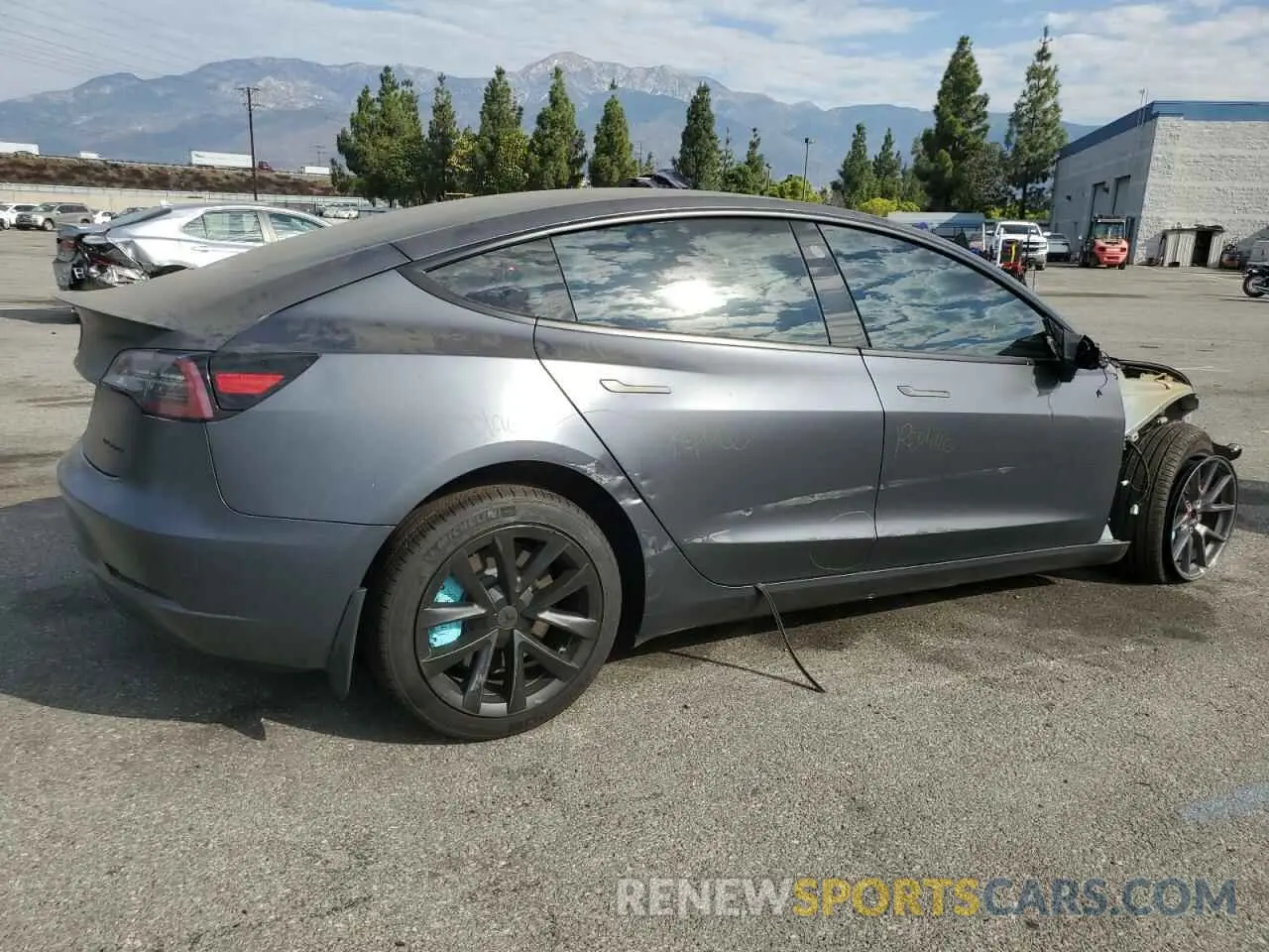 3 Photograph of a damaged car 5YJ3E1EB0PF393332 TESLA MODEL 3 2023