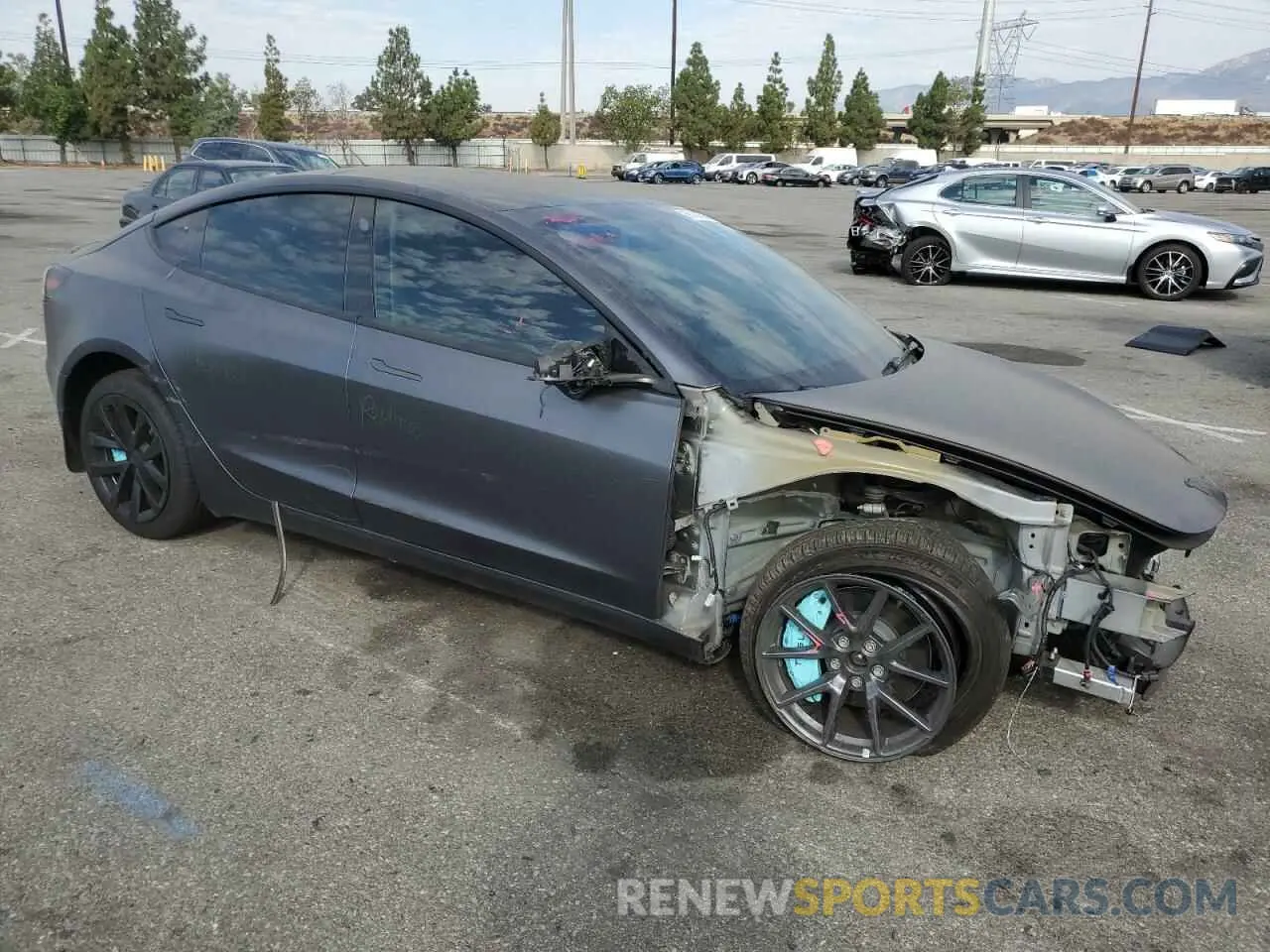 4 Photograph of a damaged car 5YJ3E1EB0PF393332 TESLA MODEL 3 2023