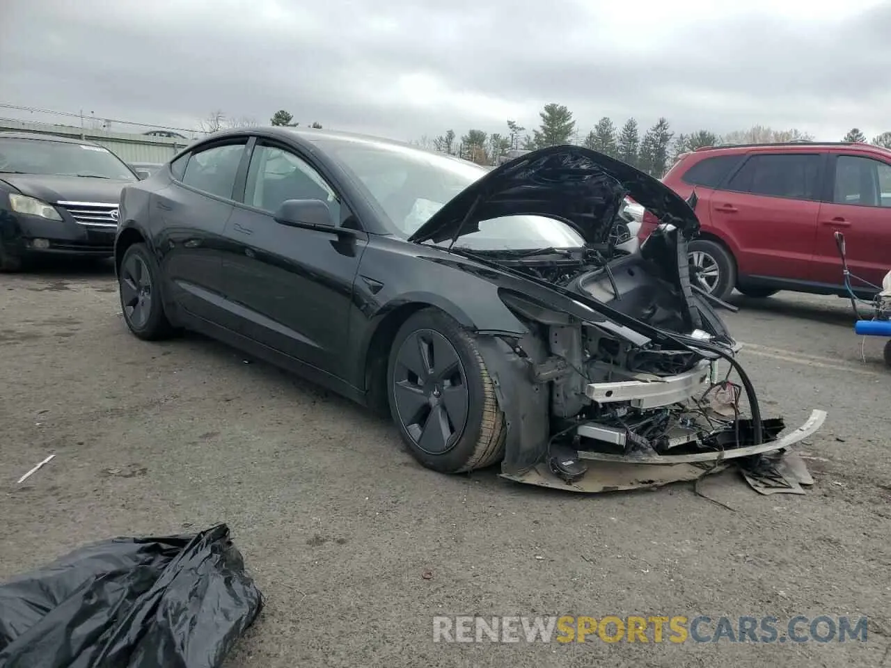 4 Photograph of a damaged car 5YJ3E1EB0PF608661 TESLA MODEL 3 2023